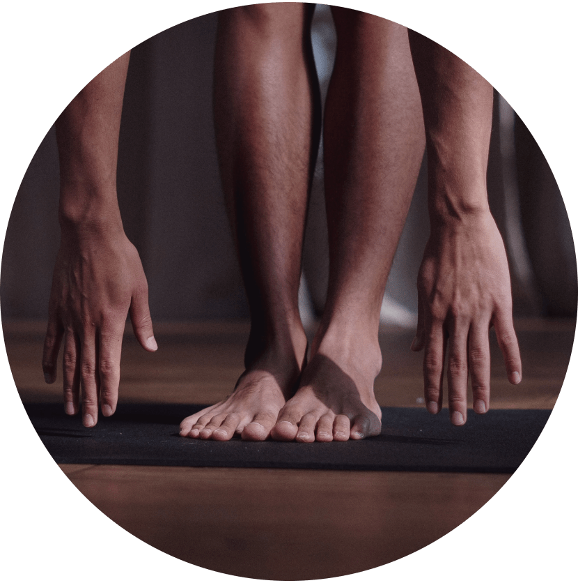 Photo of hands and feet in yoga pose